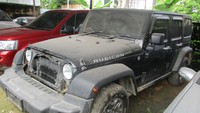 Kondisi mobil nampak diselimuti debu. Mobil yang dilelang memiliki nomor polisi BL-260-B, dokumen BPKB dan STNK juga tersedia. Foto: Lelang.go.id