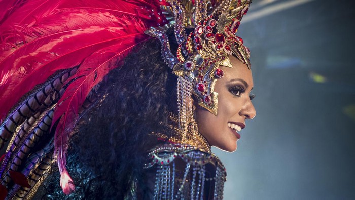 A close-up on a young and beautiful woman at the Brazilian carnival