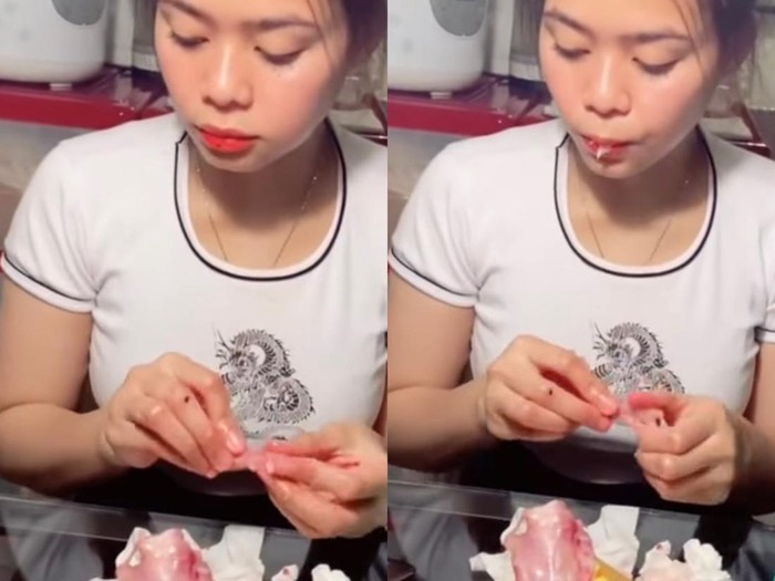 Viral wanita makan daging ayam mentah. Viral wanita makan daging ayam mentah.