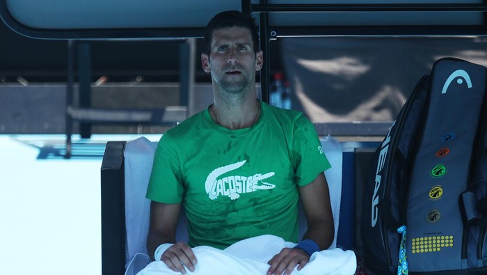 MELBOURNE, AUSTRALIA - JANUARY 13: Novak Djokovic of Serbia looks on during a practice session ahead of the 2022 Australian Open at Melbourne Park on January 13, 2022 in Melbourne, Australia. (Photo by Graham Denholm/Getty Images)
