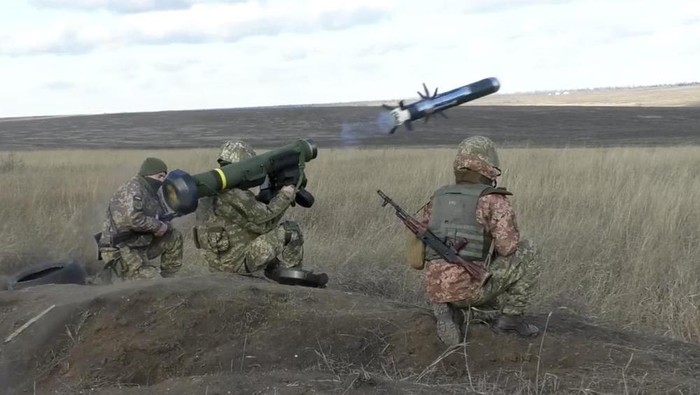 In this image taken from footage provided by the Ukrainian Defense Ministry Press Service, a Ukrainian soldiers use a launcher with US Javelin missiles during military exercises in Donetsk region, Ukraine, Wednesday, Jan. 12, 2022. President Joe Biden has warned Russias Vladimir Putin that the U.S. could impose new sanctions against Russia if it takes further military action against Ukraine. (Ukrainian Defense Ministry Press Service via AP)