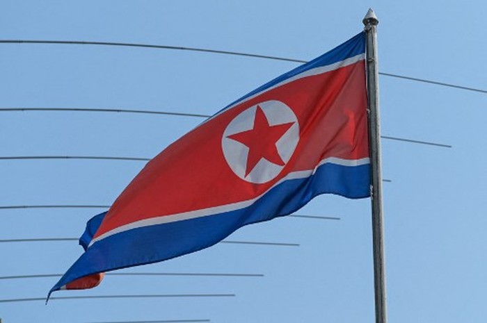 The North Korean flag is seen in the countrys embassy compounds in Kuala Lumpur on March 19, 2021, after North Korea severed diplomatic ties with Malaysia in response to the extradition of a citizen to the US earlier this month. (Photo by Sazali Ahmad / AFP)