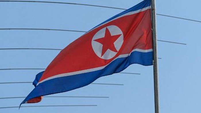 The North Korean flag is seen in the countrys embassy compounds in Kuala Lumpur on March 19, 2021, after North Korea severed diplomatic ties with Malaysia in response to the extradition of a citizen to the US earlier this month. (Photo by Sazali Ahmad / AFP)