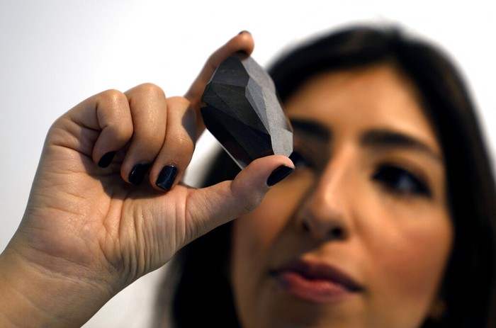 DUBAI, UNITED ARAB EMIRATES - JANUARY 17: The Largest Faceted Diamond to ever come to Auction, The Enigma, at 555.55 carats is unveiled at Sotheby's Dubai, on January 17, 2022 in Dubai, United Arab Emirates. (Photo by Neville Hopwood/Getty Images for Sotheby's Dubai)