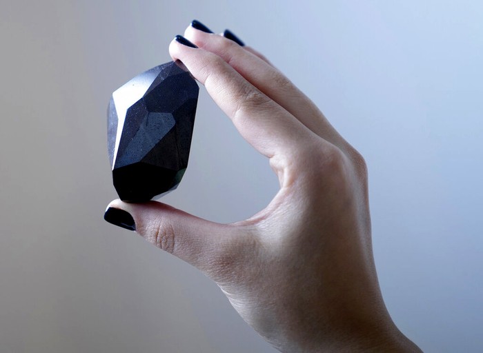 DUBAI, UNITED ARAB EMIRATES - JANUARY 17: The Largest Faceted Diamond to ever come to Auction, The Enigma, at 555.55 carats is unveiled at Sotheby's Dubai, on January 17, 2022 in Dubai, United Arab Emirates. (Photo by Neville Hopwood/Getty Images for Sotheby's Dubai)