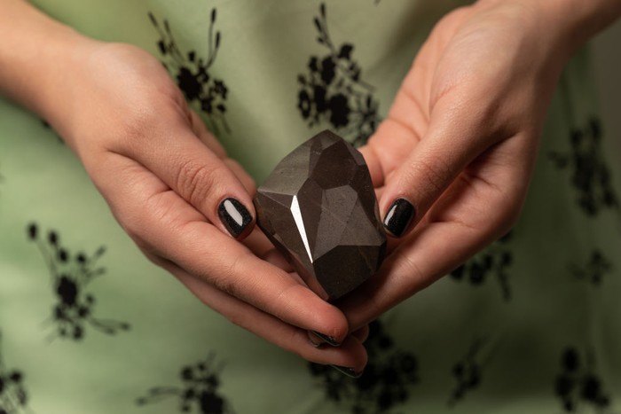 DUBAI, UNITED ARAB EMIRATES - JANUARY 17: The Largest Faceted Diamond to ever come to Auction, The Enigma, at 555.55 carats is unveiled at Sothebys Dubai, on January 17, 2022 in Dubai, United Arab Emirates. (Photo by Neville Hopwood/Getty Images for Sothebys Dubai)