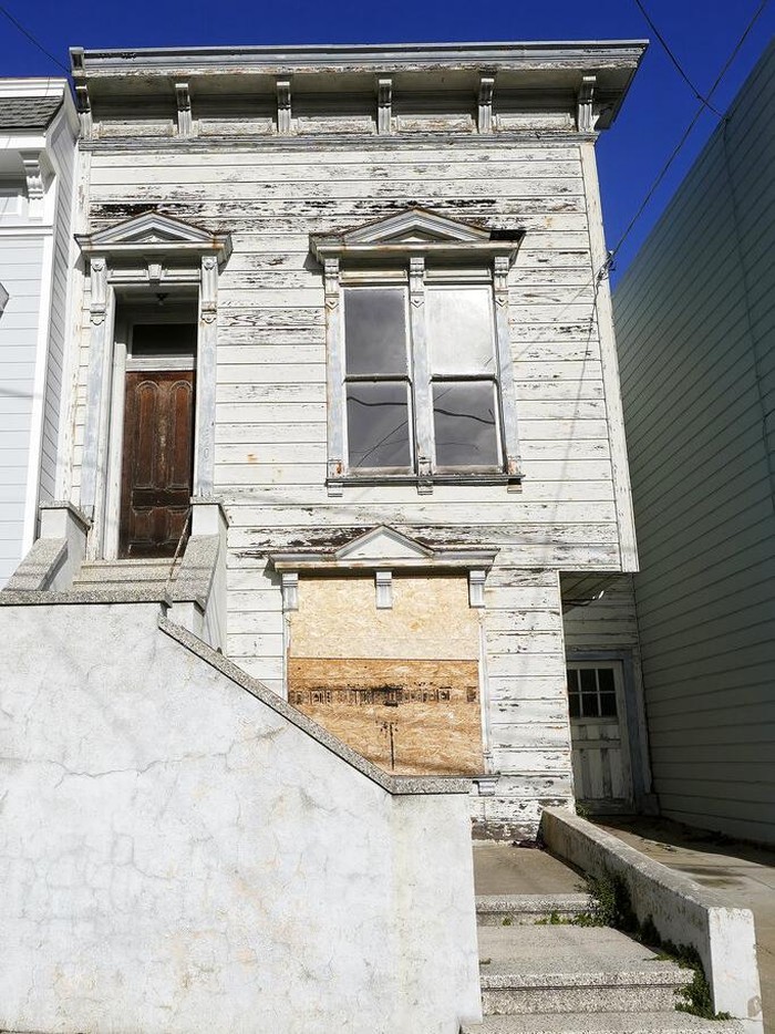 A recently sold Victorian home is shown in San Francisco, Friday, Jan. 14, 2022. The decaying, 122-year-old Victorian marketed as 