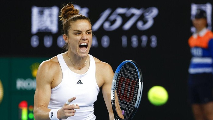 Maria Sakkari of Greece celebrates after defeating Zheng Qinwen of China in their second round match at the Australian Open tennis championships in Melbourne, Australia, Wednesday, Jan. 19, 2022. (AP Photo/Hamish Blair)
