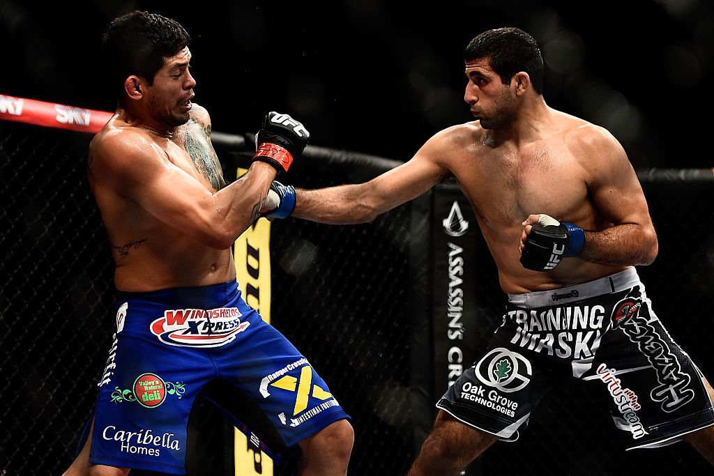 RIO DE JANEIRO, BRAZIL - OCTOBER 25: Beneil Dariush of the United States punches Diego Ferreira of Brazil in their lightweight bout during the UFC 179 event at Maracanazinho on October 25, 2014 in Rio de Janeiro, Brazil. (Photo by Buda Mendes/Getty Images)