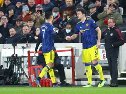 Cristiano Ronaldo ditarik keluar di pertandingan Brentford vs Manchester United, pada lanjutan Liga Inggris, Kamis (20/1/2022) dini hari WIBl. CR7 digantikan Harry Maguire. (Foto: Clive Rose/Getty Images)