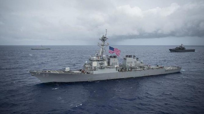 The US Navy said the USS Benfold, above, ‘asserted navigational rights and freedoms in the vicinity of the Paracel Island, consistent with international law. (AFP)