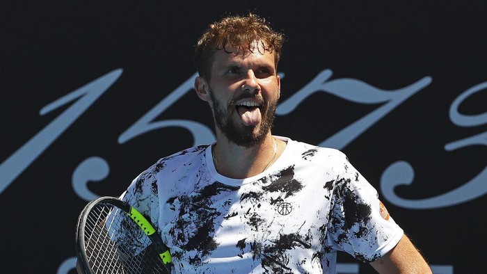 Ragam Ekspresi Petenis Dunia di Ajang Australian Open 2022 Oscar Otte of Germany reacts during his second round match against Lorenzo Sonego of Italy at the Australian Open tennis championships in Melbourne, Australia, Wednesday, Jan. 19, 2022. (AP Photo/Tertius Pickard)