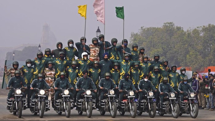 Indo Tibetan Border Security force soldiers display their skill on moving motorcycles during rehearsals for the upcoming Republic Day parade at Raisina hills, the government seat of power, in New Delhi, India, Thursday, Jan. 20, 2022. India celebrates Republic Day on Jan. 26, highlighted by a parade by different branches of the military as well as a display of arms and missiles. (AP Photo/Manish Swarup)