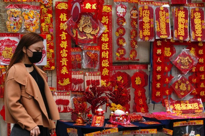 Pots of orchids are displayed for sale to celebrate the Lunar New Year in Hong Kong, Wednesday, Jan. 19, 2022. The Chinese Lunar New Year falls on Feb. 1, 2022. (AP Photo/Kin Cheung)