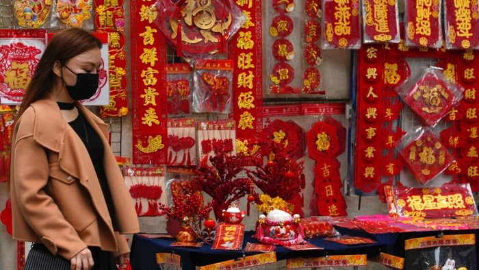 Pots of orchids are displayed for sale to celebrate the Lunar New Year in Hong Kong, Wednesday, Jan. 19, 2022. The Chinese Lunar New Year falls on Feb. 1, 2022. (AP Photo/Kin Cheung)