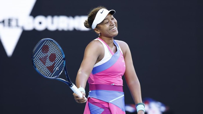 MELBOURNE, AUSTRALIA - JANUARY 19: Naomi Osaka of Japan reacts in her second round singles match against Madison Brengle of United States during day three of the 2022 Australian Open at Melbourne Park on January 19, 2022 in Melbourne, Australia. (Photo by Darrian Traynor/Getty Images)