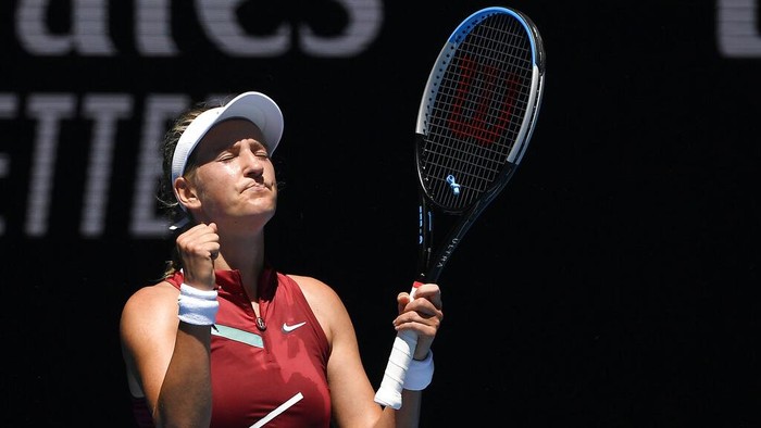 Victoria Azarenka of Belarus reacts after defeating Elina Svitolina of Ukraine in their third round match at the Australian Open tennis championships in Melbourne, Australia, Friday, Jan. 21, 2022. (AP Photo/Andy Brownbill)