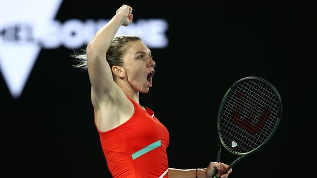 MELBOURNE, AUSTRALIA - JANUARY 20: Simona Halep of Romania  celebrates winning match point in her second round singles match against Beatriz Haddad Maia of Brazil during day four of the 2022 Australian Open at Melbourne Park on January 20, 2022 in Melbourne, Australia. (Photo by Mark Metcalfe/Getty Images)