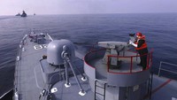 Latihan bersama tersebut mencakup unit udara dan permukaan Angkatan Laut Iran, Garda Revolusi Iran, dan pasukan maritim China dan Rusia. Iranian Army via AP.