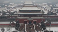 Kala Istana Kota Terlarang di China Berselimut Salju