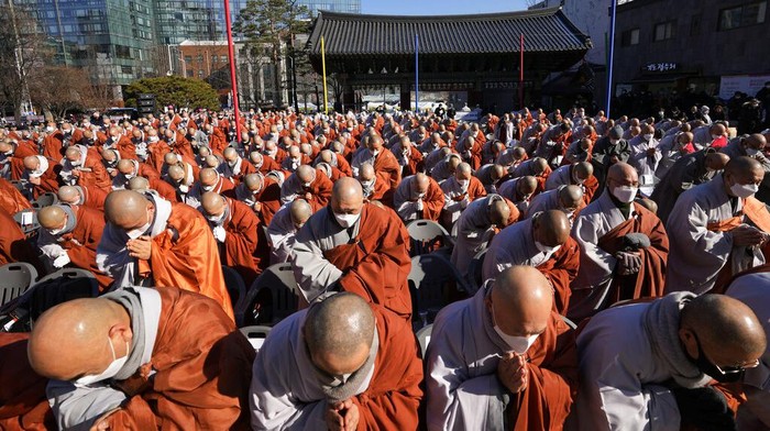 South Korean Buddhist monks participate at a rally at the Jogye temple in Seoul, South Korea, Friday, Jan. 21, 2022. Thousands of Buddhist monks gathered to protest alleged religious discrimination by South Korean government. (AP Photo/Lee Jin-man)