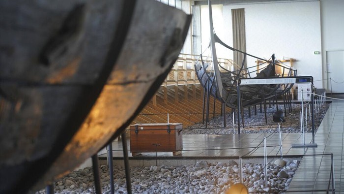 An 11th century, 14-meter Viking coastal trading vessel, sits on display at the Viking Ship Museum. Roskilde, Denmark, Monday, Jan. 17, 2022.  For thousands of years, wooden sail boats, best known for having been in use during the Viking-era, allowed the peoples of northern Europe to spread trade, influence and -- in some cases war — across the seas and rivers. In December, UNESCO, the U.N.’s culture agency, added the “clinker’ boat traditions to its list of “Intangible Cultural Heritage,” the result of the first joint nomination from the whole Nordic region. (AP Photo/James Brooks)