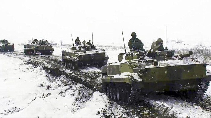 In this image taken from video provided by the Russian Defense Ministry Press Service, a pair of Tu-95 strategic bombers of the Russian air force are parked at an air base in Engels near the Volga River in Russia, Monday, Jan. 24, 2022. Russia has intensified military drills amid tensions with the West over the buildup of an estimated 100,000 Russian troops near Ukraine that fueled Western fears of an invasion. (Russian Defense Ministry Press Service via AP)