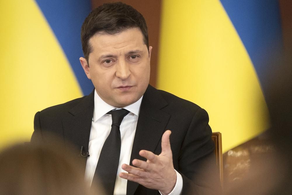In this handout photo provided by the Ukrainian Presidential Press Office, Ukrainian President Volodymyr Zelenskyy speaks during a news conference in Kyiv, Ukraine, Friday, Jan. 28, 2022. High-stakes diplomacy continued on Friday in a bid to avert a war in Eastern Europe. The urgent efforts come as 100,000 Russian troops are massed near Ukraine's border and the Biden administration worries that Russian President Vladimir Putin will mount some sort of invasion within weeks. (Ukrainian Presidential Press Office via AP)