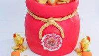 Seperti cake berbentuk kantung koin ini. Selain cantik, cake ini memiliki filosofi dan harapan agar di tahun baru selalu mendapat keberuntungan dan kemakmuran. Foto: instagram @steeletecake
