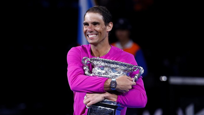 MELBOURNE, AUSTRALIA - JANUARY 30: Rafael Nadal of Spain holds the Norman Brookes Challenge Cup as he celebrates victory in his Men’s Singles Final match against Daniil Medvedev of Russia during day 14 of the 2022 Australian Open at Melbourne Park on January 30, 2022 in Melbourne, Australia. (Photo by Daniel Pockett/Getty Images)