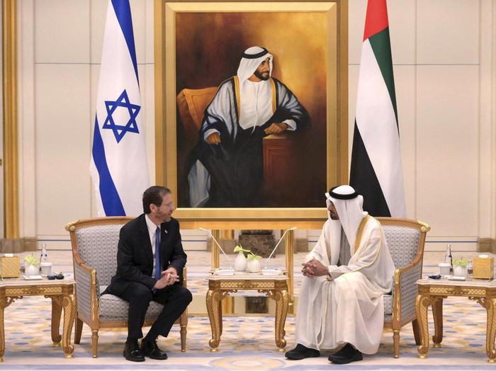 President Isaac Herzog, left, meets with the Crown Prince of Abu Dhabi, Sheikh Mohammed bin Zayed Al Nahyan, in Abu Dhabi, United Arab Emirates, Sunday, Jan. 30, 2022. Israels president arrived in the United Arab Emirates on Sunday in the first official visit by the countrys head of state, the latest sign of deepening ties between the two nations as tensions rise in the region. (Amos Ben Gershom/GPO via AP)