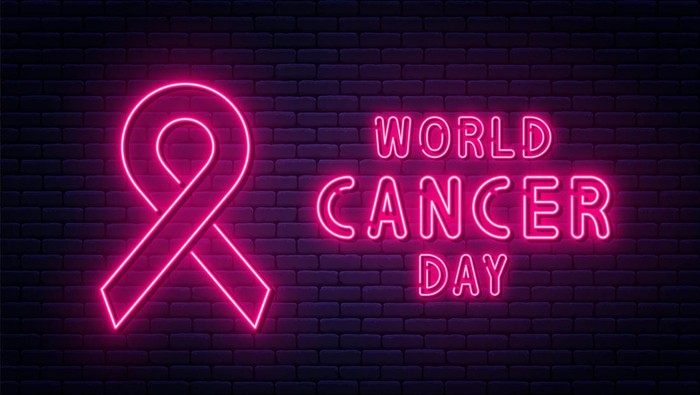 1082820348 World Cancer Day, February 4. Red ribbon in neon light style. World Cancer Day background design. Vector