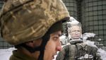 Foto Putin Jadi Sasaran Tembak di Ukraina
