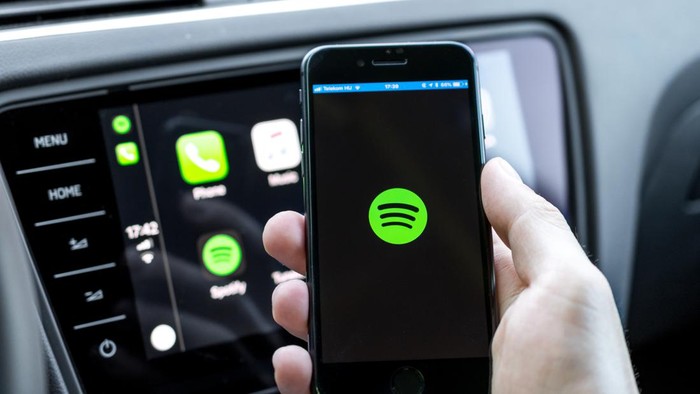 Miskolc, Hungary - May 20, 2018: Spotify starting up on an iPhone 8 connected to a new Skoda car.