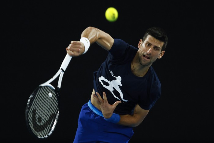 MELBOURNE, AUSTRALIA - JANUARY 14: Novak Djokovic of Serbia serves during a practice session ahead of the 2022 Australian Open at Melbourne Park on January 14, 2022 in Melbourne, Australia. (Photo by Daniel Pockett/Getty Images)