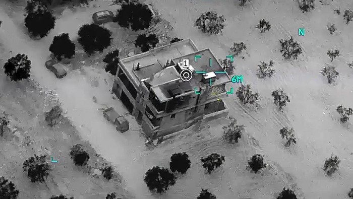 This image from video provided by the Department of Defense and released on Feb. 3, 2022, shows the compound before a raid where Abu Ibrahim al-Hashimi al-Qurayshi, leader of the Islamic State Group, died in Syrias northwestern Idlib province. A U.S. official says that the militant leader, one of the worlds most wanted terrorists, exploded a bomb that killed himself and members of his family during the overnight raid by an elite U.S. military force. (Department of Defense via AP)