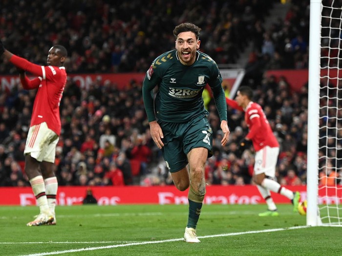 MANCHESTER, ENGLAND - FEBRUARY 04: Matt Crooks of Middlesbrough celebrates after scoring during the Emirates FA Cup Fourth Round match between Manchester United and Middlesbrough at Old Trafford on February 04, 2022 in Manchester, England. (Photo by Clive Mason/Getty Images)