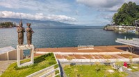 Penataan Ruang Terbuka Publik (RTP) Pantai Bebas Parapat yang memiliki daya tarik keindahan pemandangan Danau Toba ini dikerjakan di atas lahan seluas kurang lebih 10.000 m2 oleh Balai Prasarana Permukiman Wilayah (BPPW) Sumatera Utara Direktorat Jenderal Cipta Karya Kementerian PUPR sejak 21 Oktober 2020 dan selesai akhir 2021.