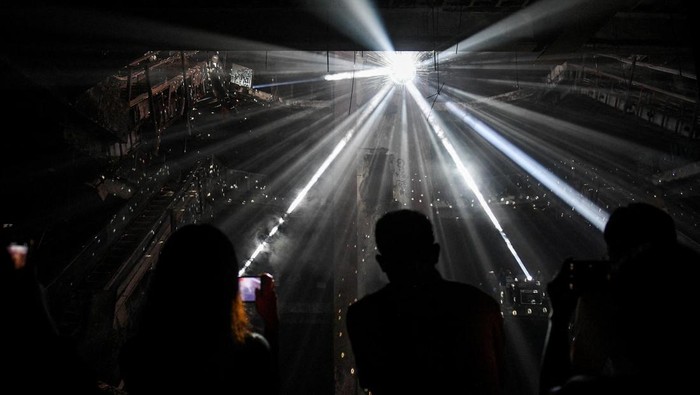 An abandoned New World department store is seen as a part of a light installation exhibition to promote tourism, in Bang Lamphu district, Bangkok Thailand February 6, 2022. REUTERS/Chalinee Thirasupa