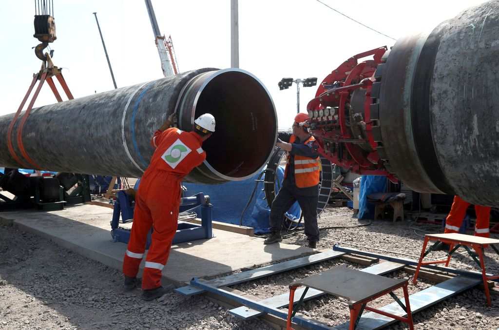 FILE PHOTO: Workers are seen at the construction site of the Nord Stream 2 gas pipeline, near the town of Kingisepp, Leningrad region, Russia, June 5, 2019. REUTERS/Anton Vaganov/File Photo