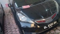 Selanjutnya, Honda Jazz tahun 2013 warna hitam mutiara. Foto: Lelang.go.id