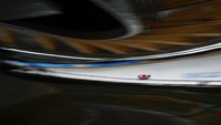 Natalie Maag, dari Swiss, meluncur selama tunggal putri luge run 1 di Olimpiade Musim Dingin 2022, Senin, (7/2/2022), di distrik Yanqing, Beijing. (Foto AP/Pavel Golovkin)