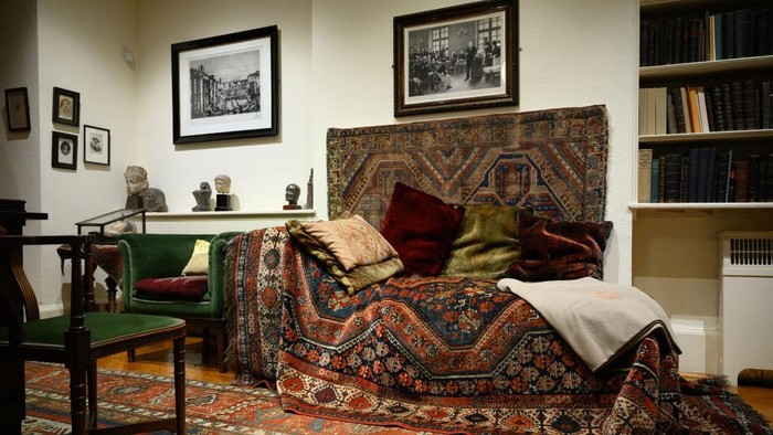 LONDON, ENGLAND - FEBRUARY 10: A 19th century jade screen, which was one of only two items smuggled out of Austria in 1938 by Sigmund Freud as he fled Nazi persecution, is seen on his desk at the Freud Museum on February 10, 2022 in London, England. The Museum reassembles Freud's collection of Chinese objects for the first time at his London home and explores his fascination with China. (Photo by Leon Neal/Getty Images)