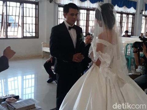 Foto keluarga Vinda Virginia dan Erwin Pangaila.