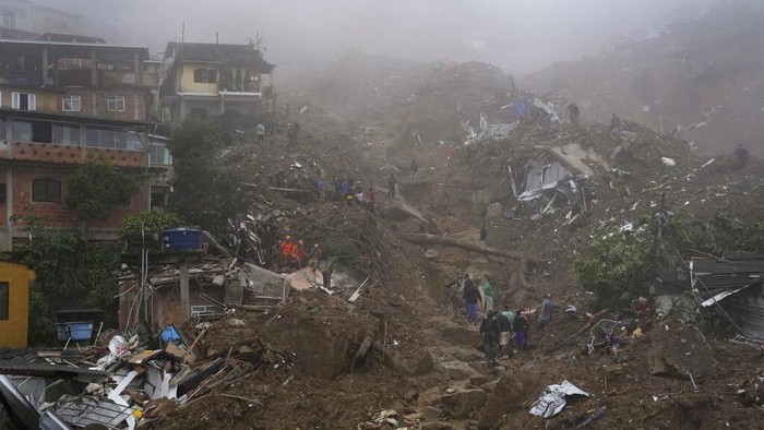 An aerial view shows neighborhood affected by landslides in Petropolis, Brazil, Wednesday, Feb. 16, 2022. Heavy rains set off mudslides and floods in a mountainous region of Rio de Janeiro state, killing multiple people, authorities reported. (AP Photo/Silvia Izquierdo