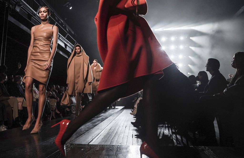 Fashion from Michael Kors is modeled during Fashion Week, Tuesday, Feb. 15, 2022 in New York. (AP Photo/Bebeto Matthews)