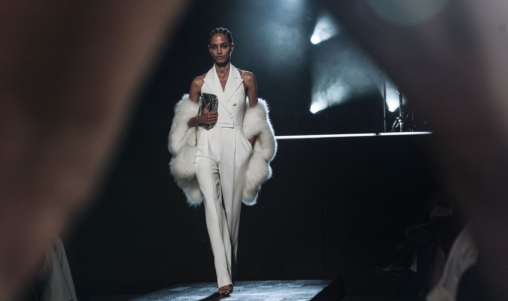 Fashion from Michael Kors is modeled during Fashion Week, Tuesday, Feb. 15, 2022 in New York. (AP Photo/Bebeto Matthews)