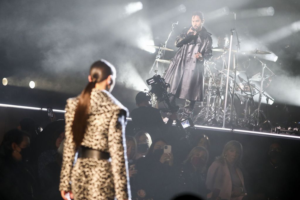 Fashion from Michael Kors is modeled during Fashion Week, Tuesday, Feb. 15, 2022 in New York. (AP Photo/Bebeto Matthews)