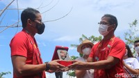 Menparekraf Sandiaga Uno saat pengukuhan badan promosi pariwisata Kota Bitung, di Kecamatan Aertembaga, Bitung, Rabu (16/2/2022). Foto: Trisno Mais/detikcom