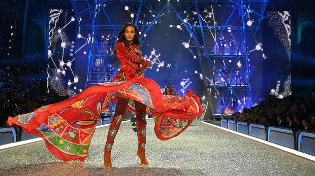 LONDON, ENGLAND - DECEMBER 02:  Model Adriana Lima walks the runway during the 2014 Victoria's Secret Fashion Show at Earl's Court Exhibition Centre on December 2, 2014 in London, England.  (Photo by Dimitrios Kambouris/Getty Images for Victoria's Secret)
